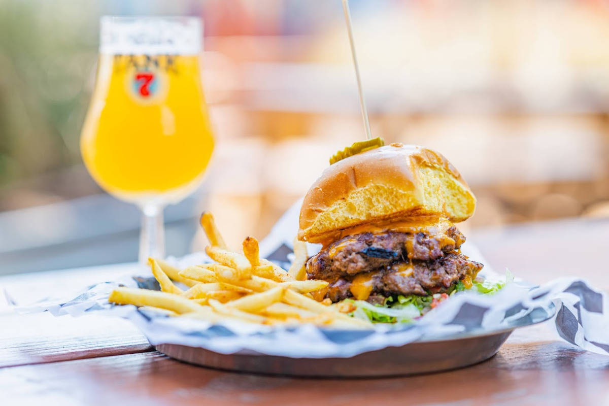 Burger and beer in the back